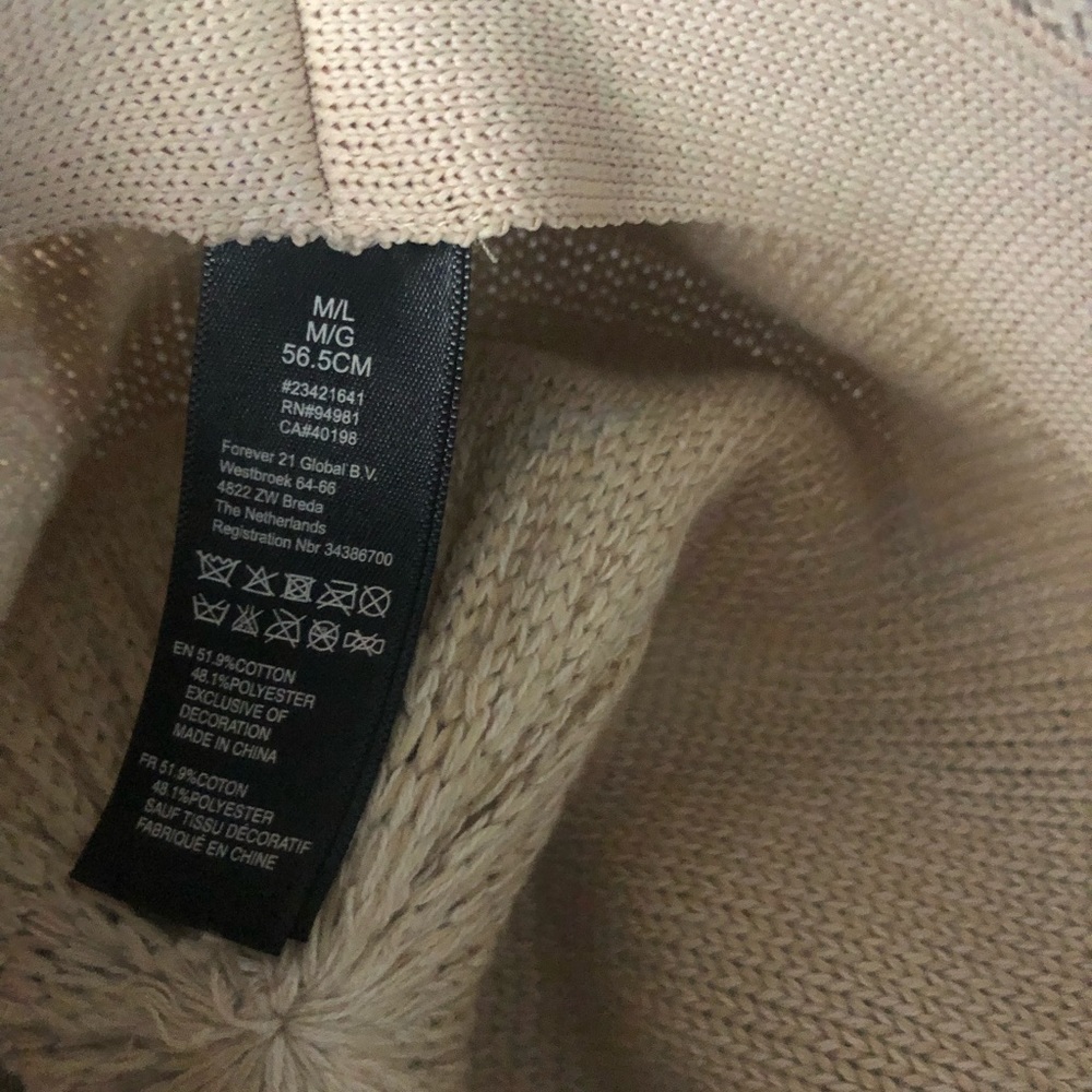 Creme colored fedora with brown woven belt